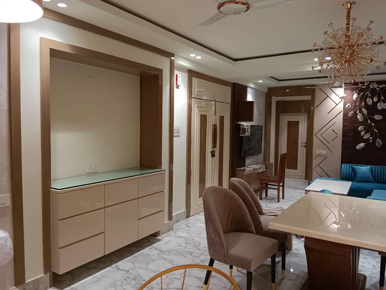 Custom bedroom interiors with elegant wardrobes, comfortable furniture, soft lighting and space-saving storage, designed for modern homes in Parnasree Pally.
